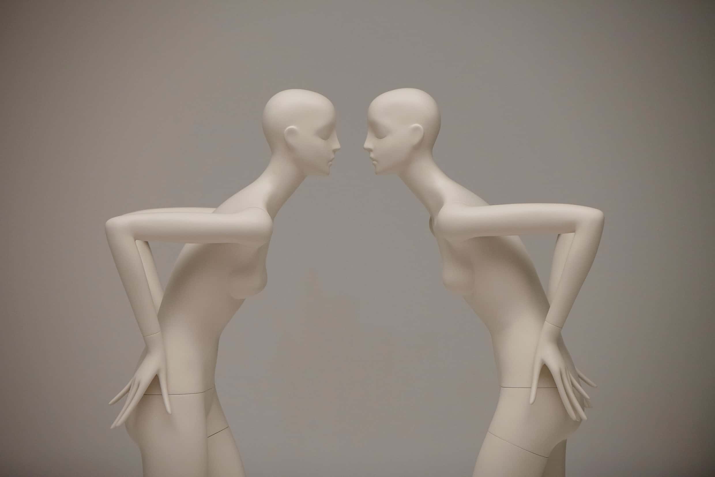 Two Aloof mannequins face eachother