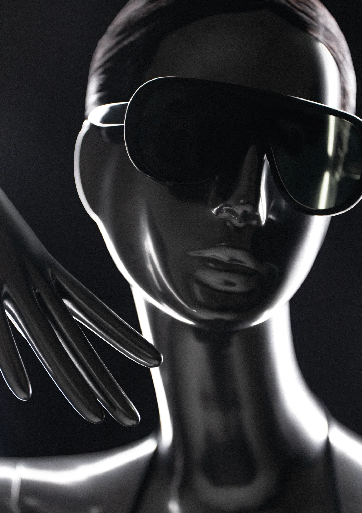 Close-up of a chrome Obsession mannequin face with sunglasses