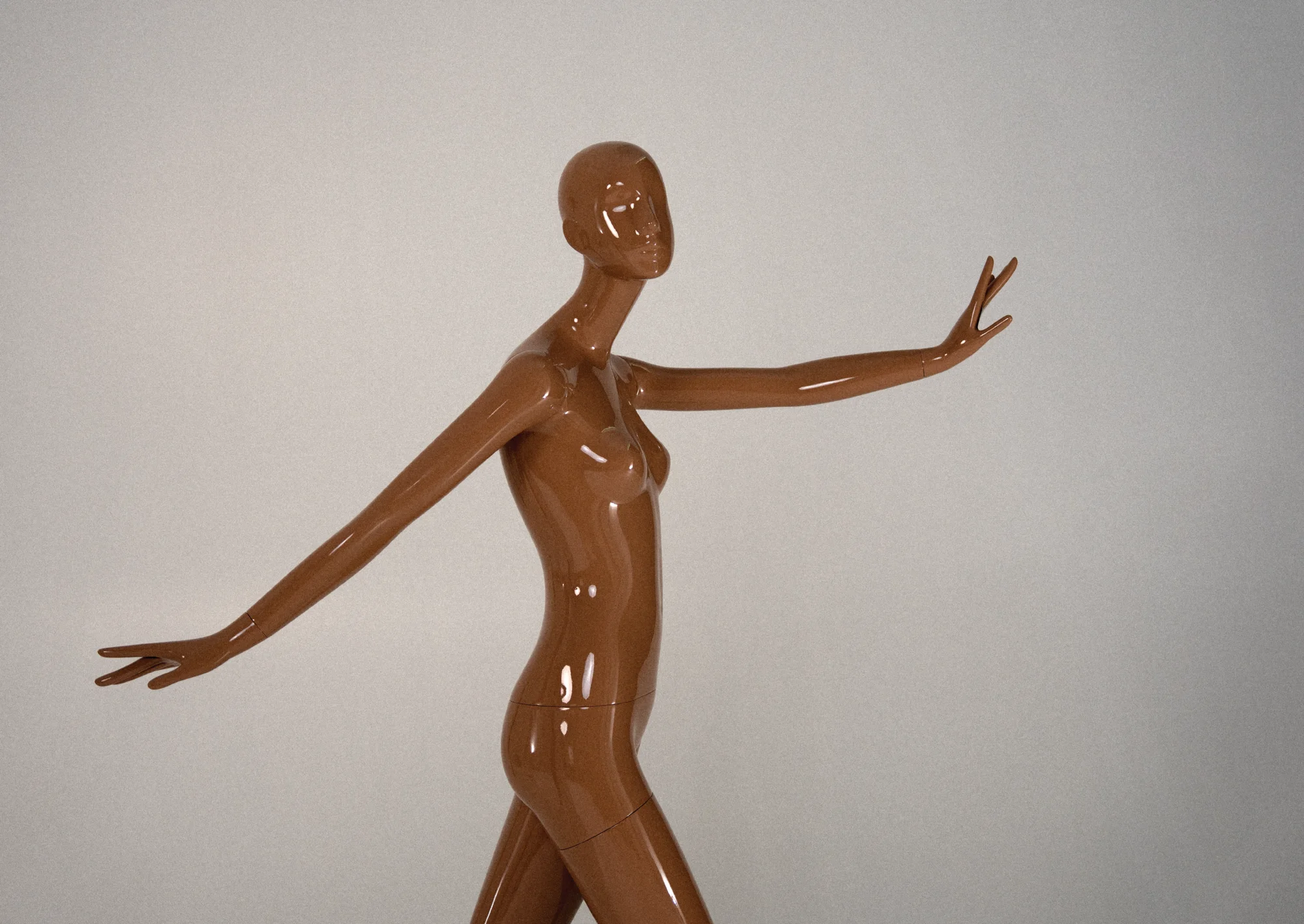 Gloss Honey Gold Obsession mannequin walking with arms outstretched
